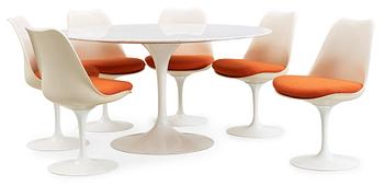 An Eero Saarinen 'Tulip' marble top table and six chairs, Knoll International.