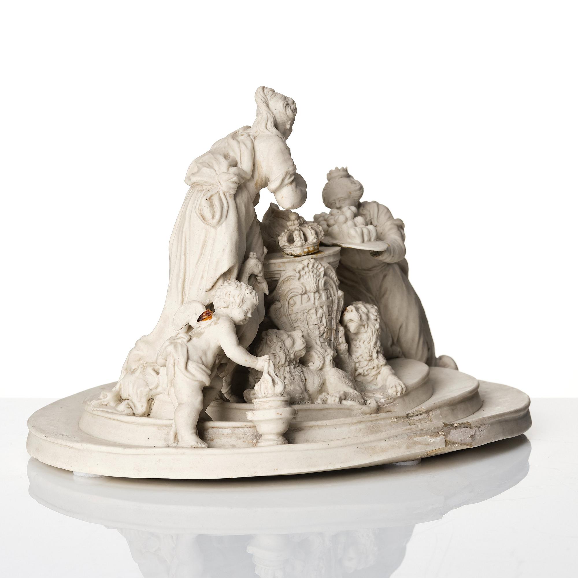 An Italian bisquit porcelain figure group with the arms of Savojen, Vinovo, marked 1817.