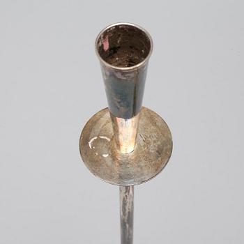 A pair of silver candelsticks by Tore Eldh, K&EX, Gothenburg, 1962.