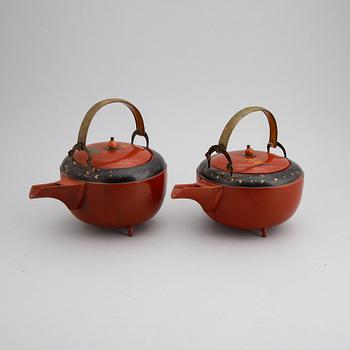A pair of Japanese red lacquer pots, presumably Meiji (1868-1912).