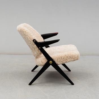 A 1950's 'Triva' easy chair by Bengt Ruda, from Nordiska Kompaniet.