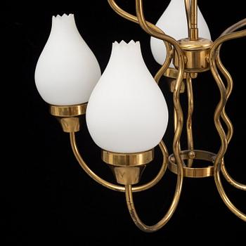 A brass and glass ceiling lamp for ten lights, first half 20th century.