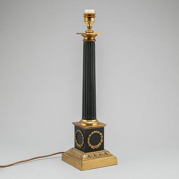 A modern Empire-style table lamp.