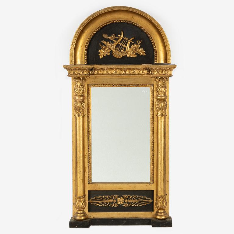 An Empire mirror, first half of the 20th Century.