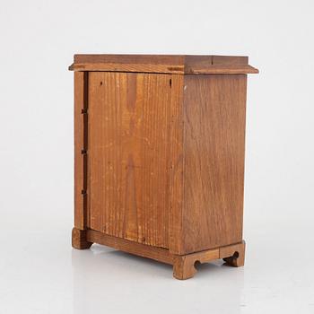 A mahogany miniature commode, later part of the 19th century.