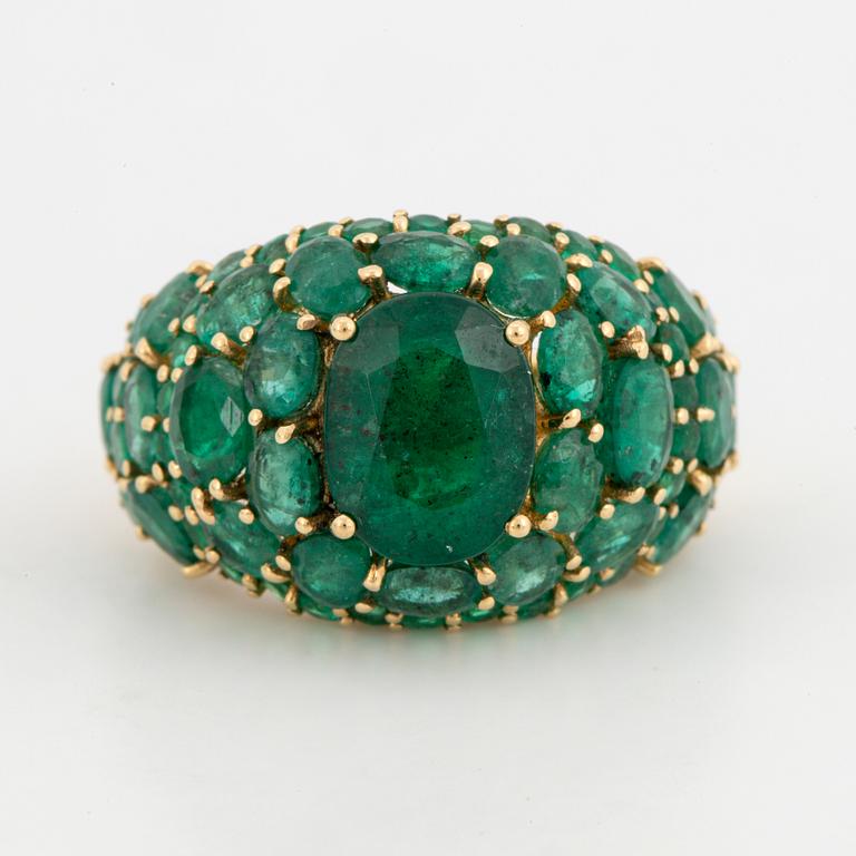 Emerald and brilliant-cut diamond ring.