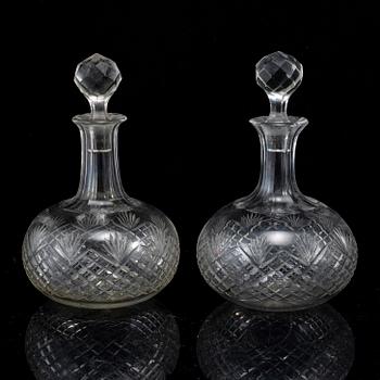 A set of four bottles with stoppers, 20th Century.
