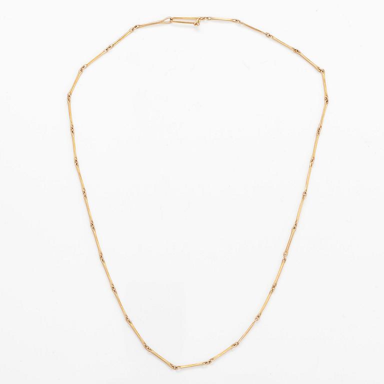 BJÖRN WECKSTRÖM, A 14K gold pendant "Reindeer clock" with an amethyst and chain "Raito". Lapponia 1978  and 1982.