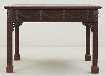 An English 18th century mahogany library table in the manner of Thomas Chippendale.