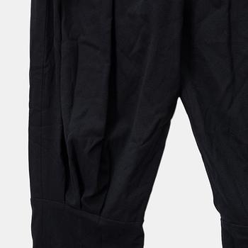 Chanel, A pair of black silk pants, size 34.