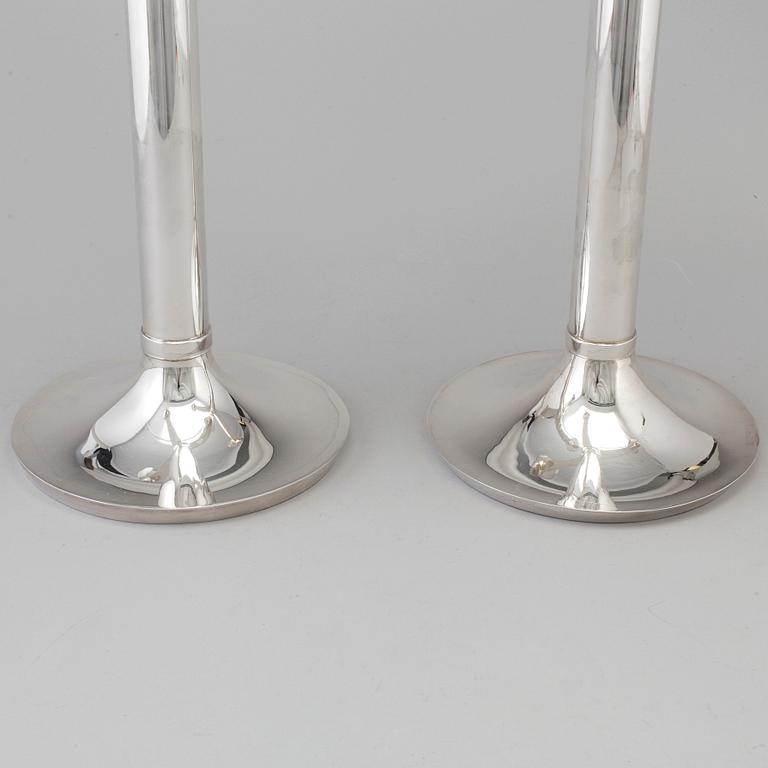 RICHARD FOX, a pair of three armed, four light sterling candelabra, London, 2001 and 2013.