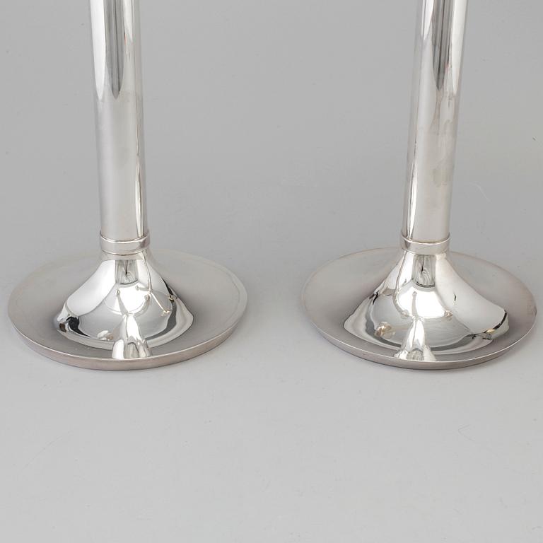 RICHARD FOX, a pair of three armed, four light sterling candelabra, London, 2001 and 2013.