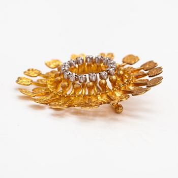 Tapio Wirkkala,  "Sun", an 18K gold brooch with diamonds ca 0.13 ct in total. Kultakeskus, Hämeenlinna 2000.