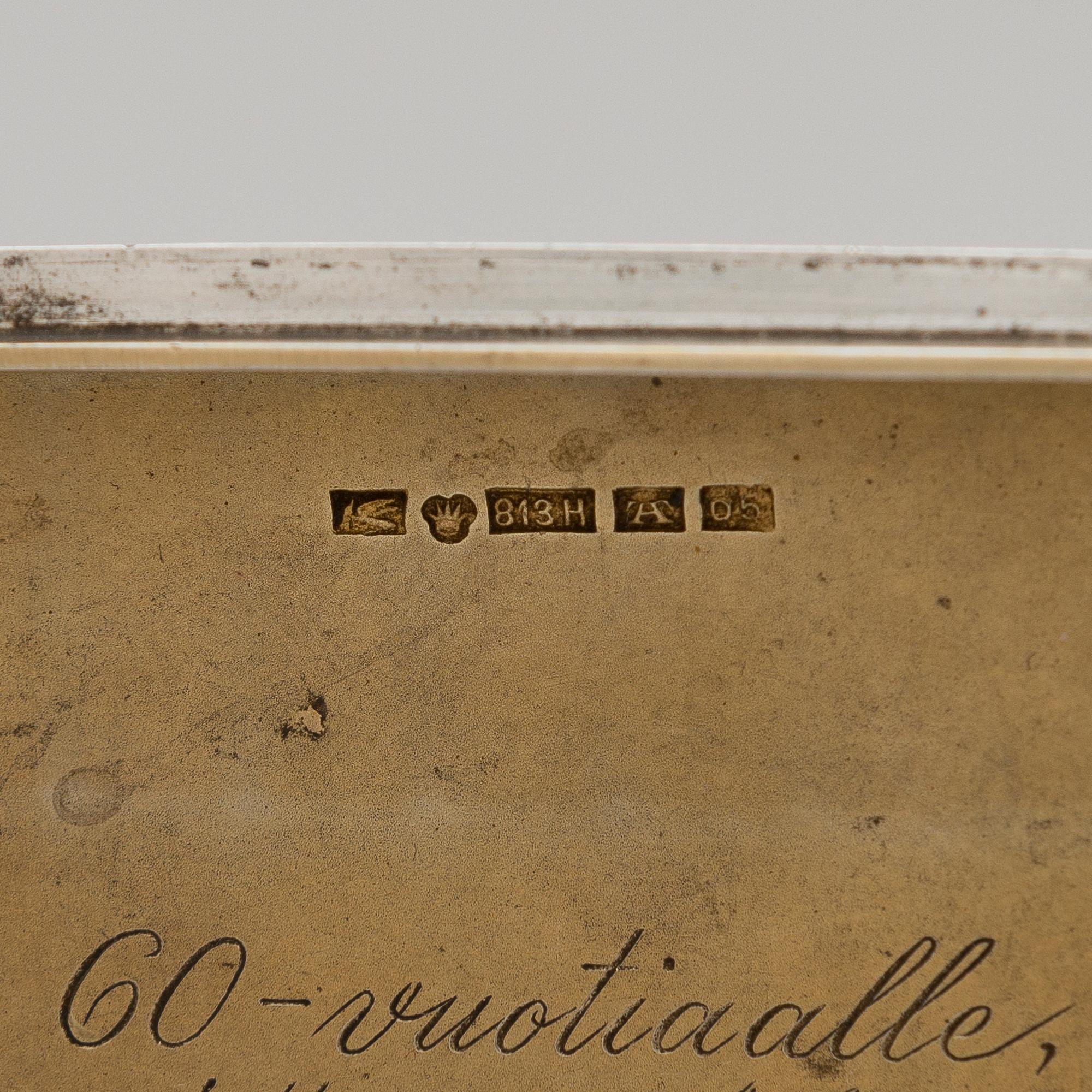 Three silver cigarette cases and a silver pillbox, marked in Finland and Germany, first half of the 20th Century.