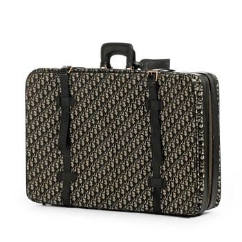 CHRISTIAN DIOR, a monogram canvas suitcase.