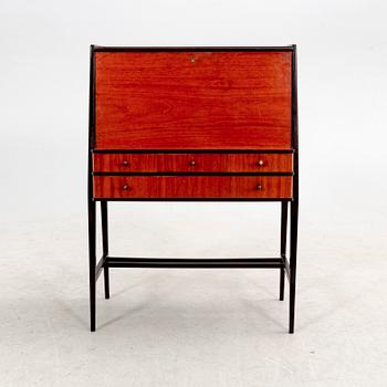 A 1950s mahogany writing desk.