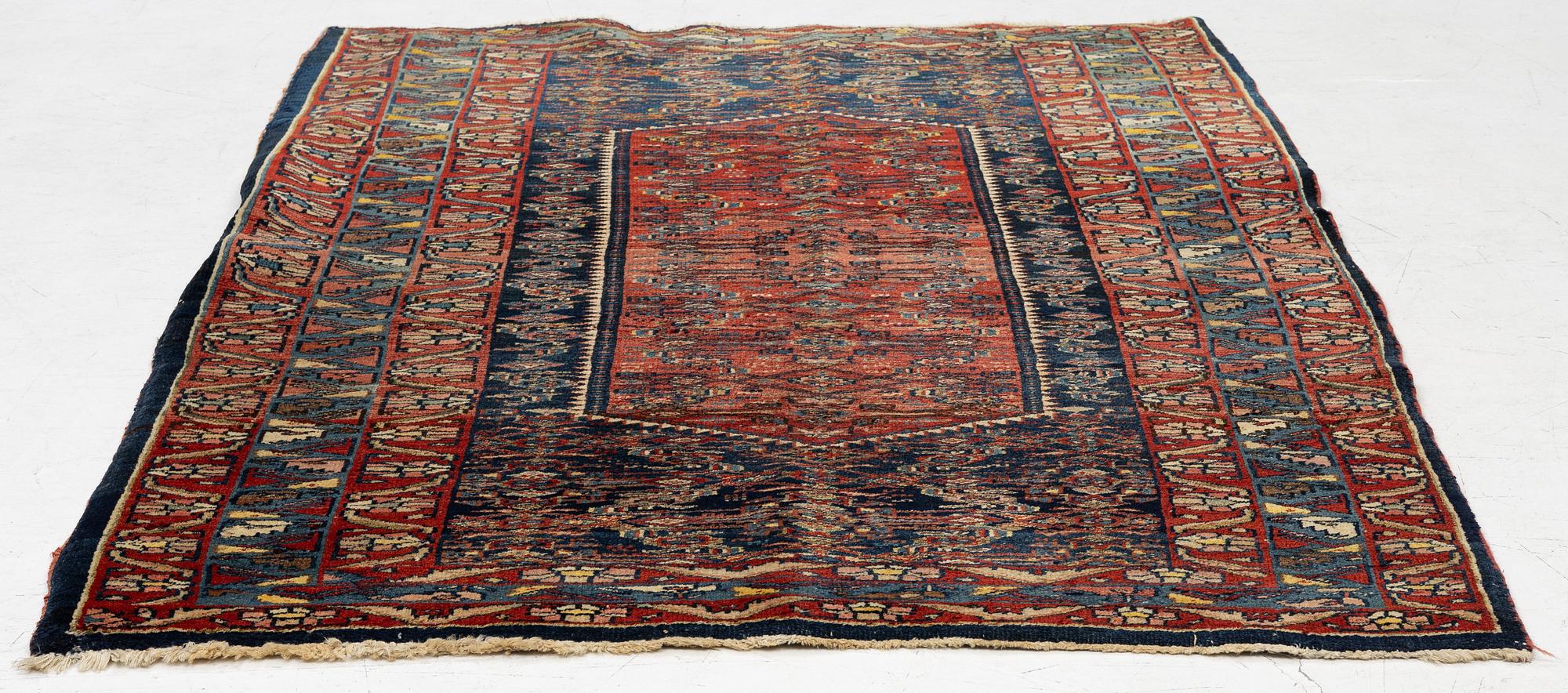 A Sarouk rug, west Persia, c. 197 x 128 cm.