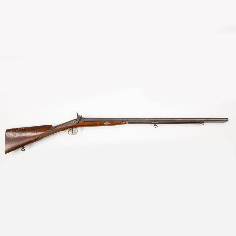 A mid-19th Century Belgian double barreled percussion shotgun marked Canon A Rubans.