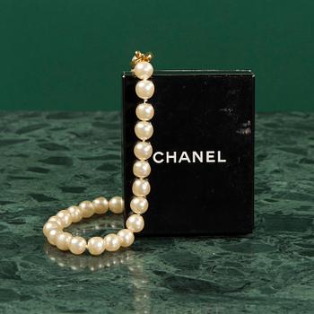 A necklace by CHANEL.