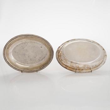 A set of four silver plated entree dishes, England.