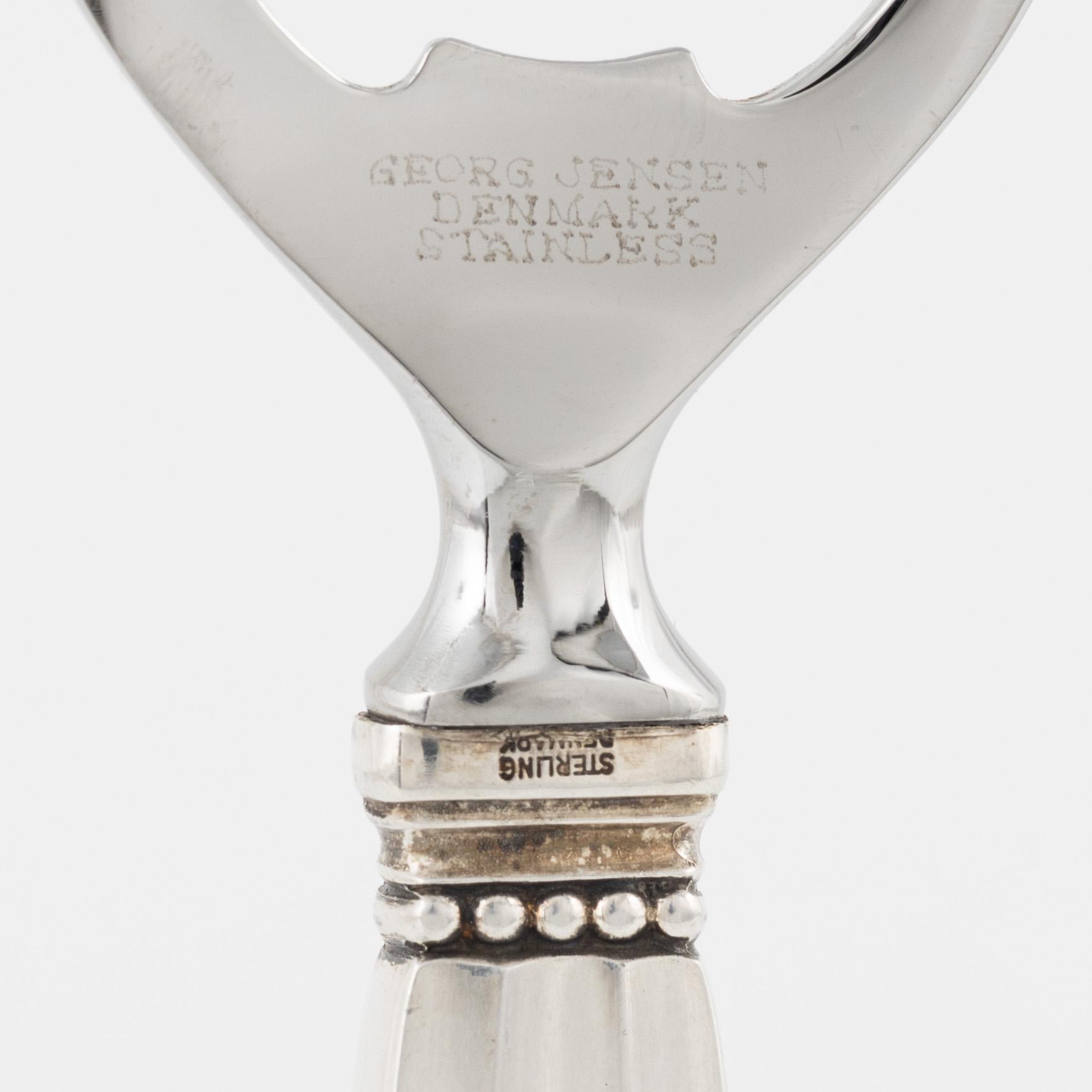 A sterlingsilver bottle opener, "Konge", Johan Rodhe for Georg Jensen.