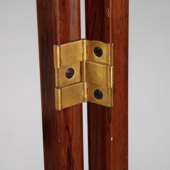 An early 20th century folding screen.