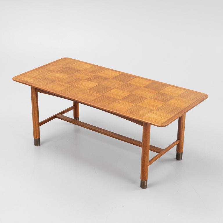 A Teak Veneer Coffee Table, mid 20th century.