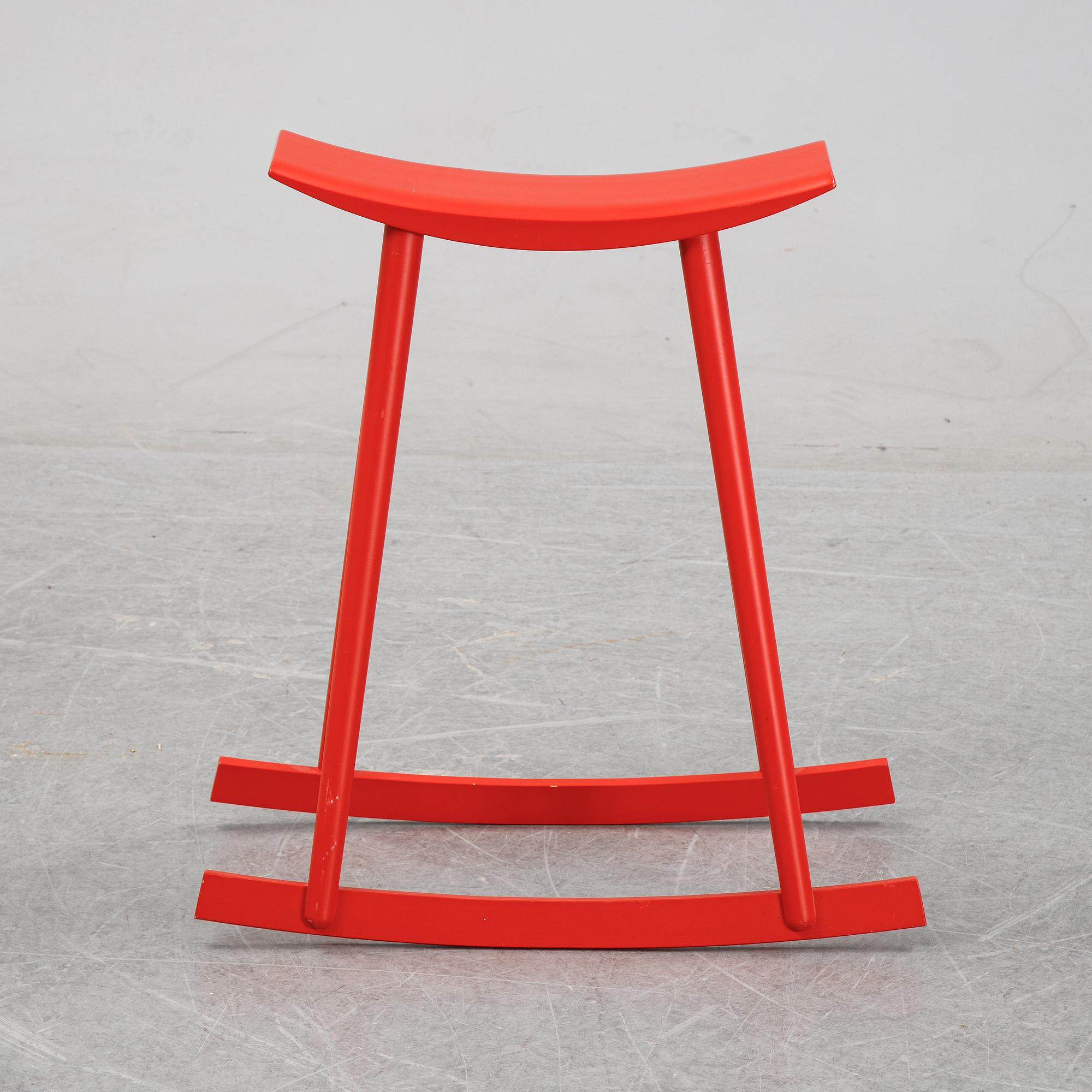Per Sundstedt, a wood rocking stool from Pyra, Sweden.