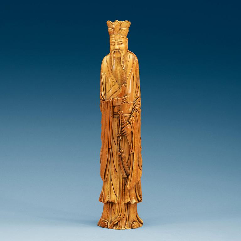 A carved ivory figure of one of the immortals, China presumably early 20th century.