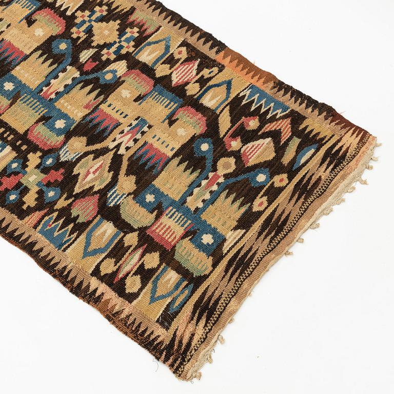 A bench cushion, tapestry weave, c. 245 x 57 cm, Östra district, Blekinge, Sweden, mid 19th century.