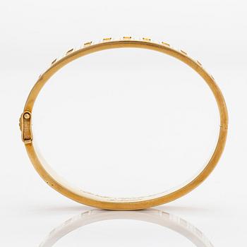 Kalevala Koru, armband, "Metsäpirtti", 18K guld. Helsingfors 1957.