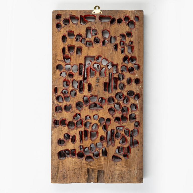 A wooden panel, China, late Qing dynasty.