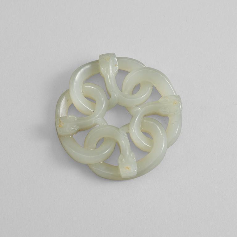 A carved Chinese nephrite pendant.