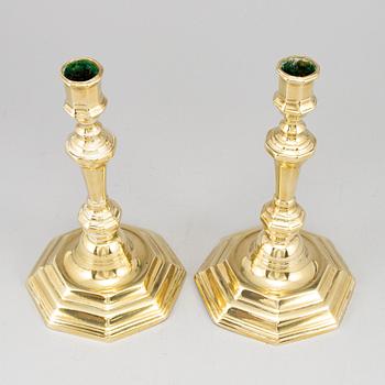 A pair of French bronze candlesticks.