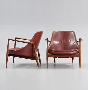 A pair of Ib Kofod Larsen palisander and brown leather 'Elisabeth' easy chairs, Denmark 1950's-60's.