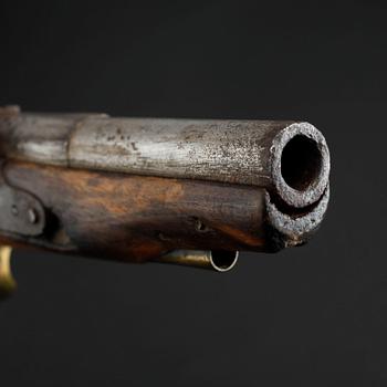 An early 19th century cap lock revolver.