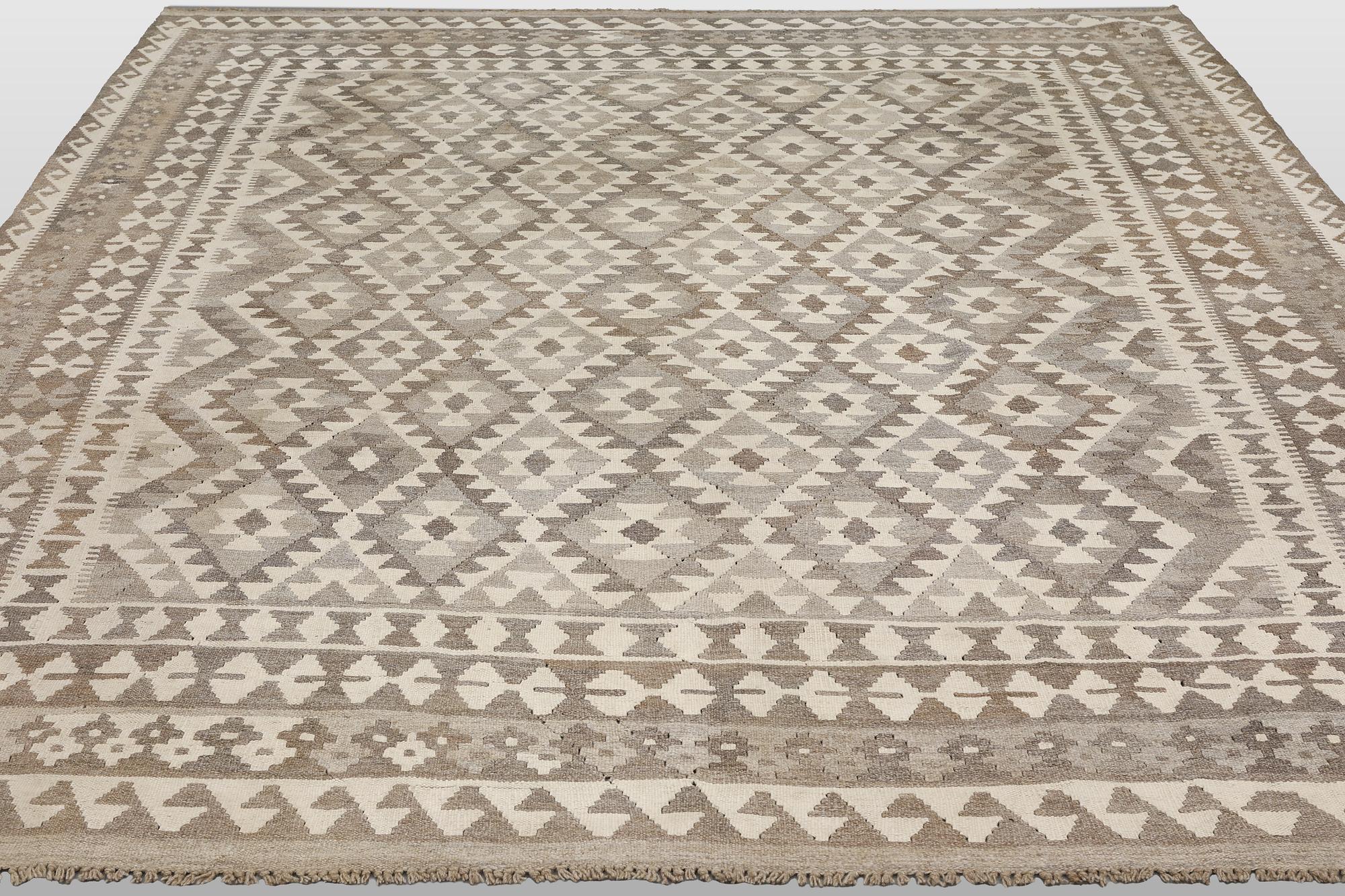 A Kilim rug, approx. 294 x 250 cm.