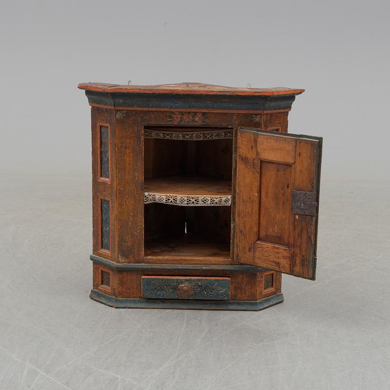 A 18/19th century  pine wall cabinet.