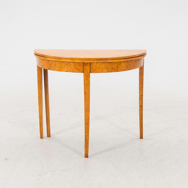 A birch folding table later part of the 19th century.