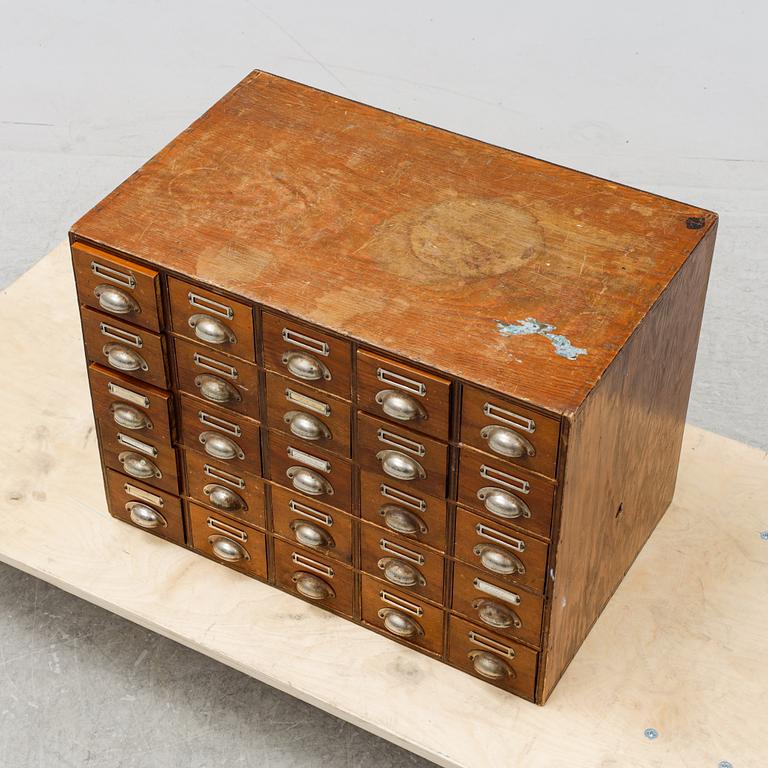 A pine cabinet with drawers, first half of the 20th Century.
