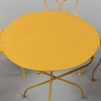 A set of six garden chairs and a table, (7parts), chairs signed Skoglund & Olson Gefle. Ca 1900.