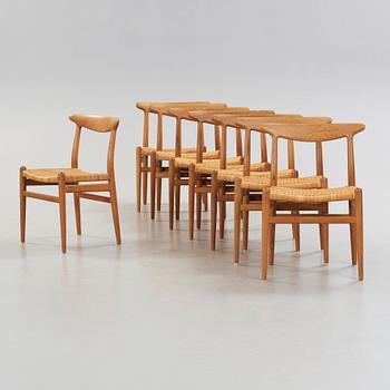 Hans J. Wegner, A set of eight oak chairs by Carl Madsen, Denmark 1950-60's.