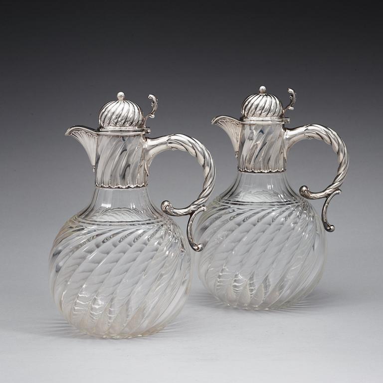 A pair of Swedish 19th century silver and glas jugs, marks of K. Andersson, Stockholm 1893.