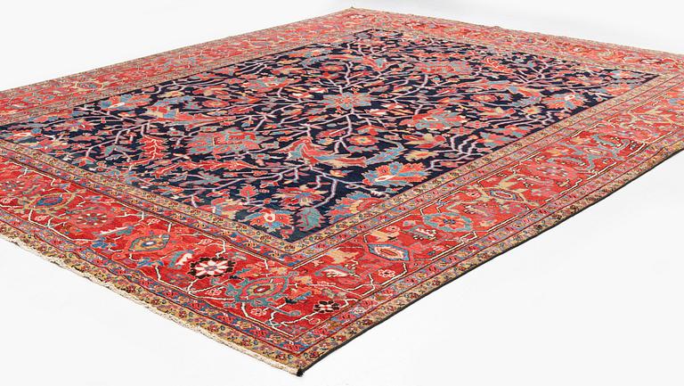 An antique Heriz Serapi, north west Persia, ca 421 x 352 cm.