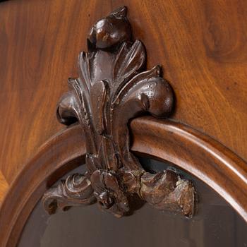 A mahogany veneered vitrine cabinet, mid 19t Century.