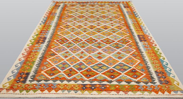 A kilim carpet, ca 306 x 203 cm.