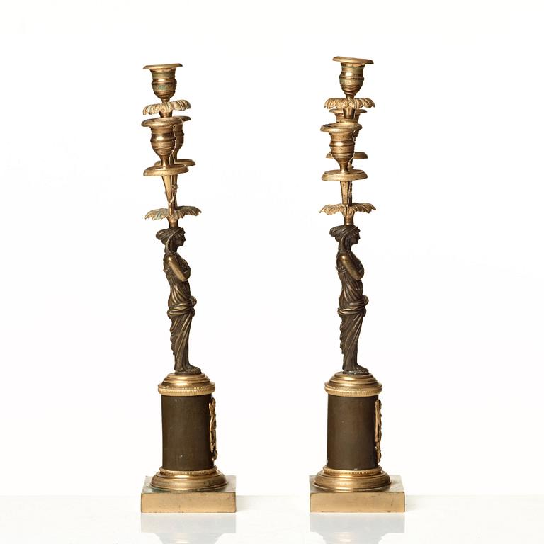 A pair of late Gustavian circa 1800 three-light candelabra.