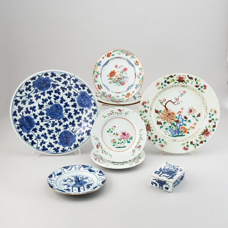 A set with two famille rose serving dishes, six odd plates, and a box with cover, Qing dynasty, 18th/19th Century.