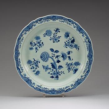 A pair of large blue and white serving dishes with strainers, Qing dynasty, Qianlong (1736-95).