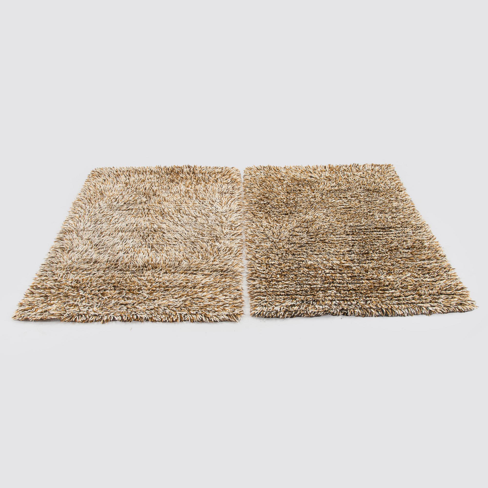 A pair of 1960s-70s rya rugs. Ca. 134 x 91cm and 133 x 91cm.